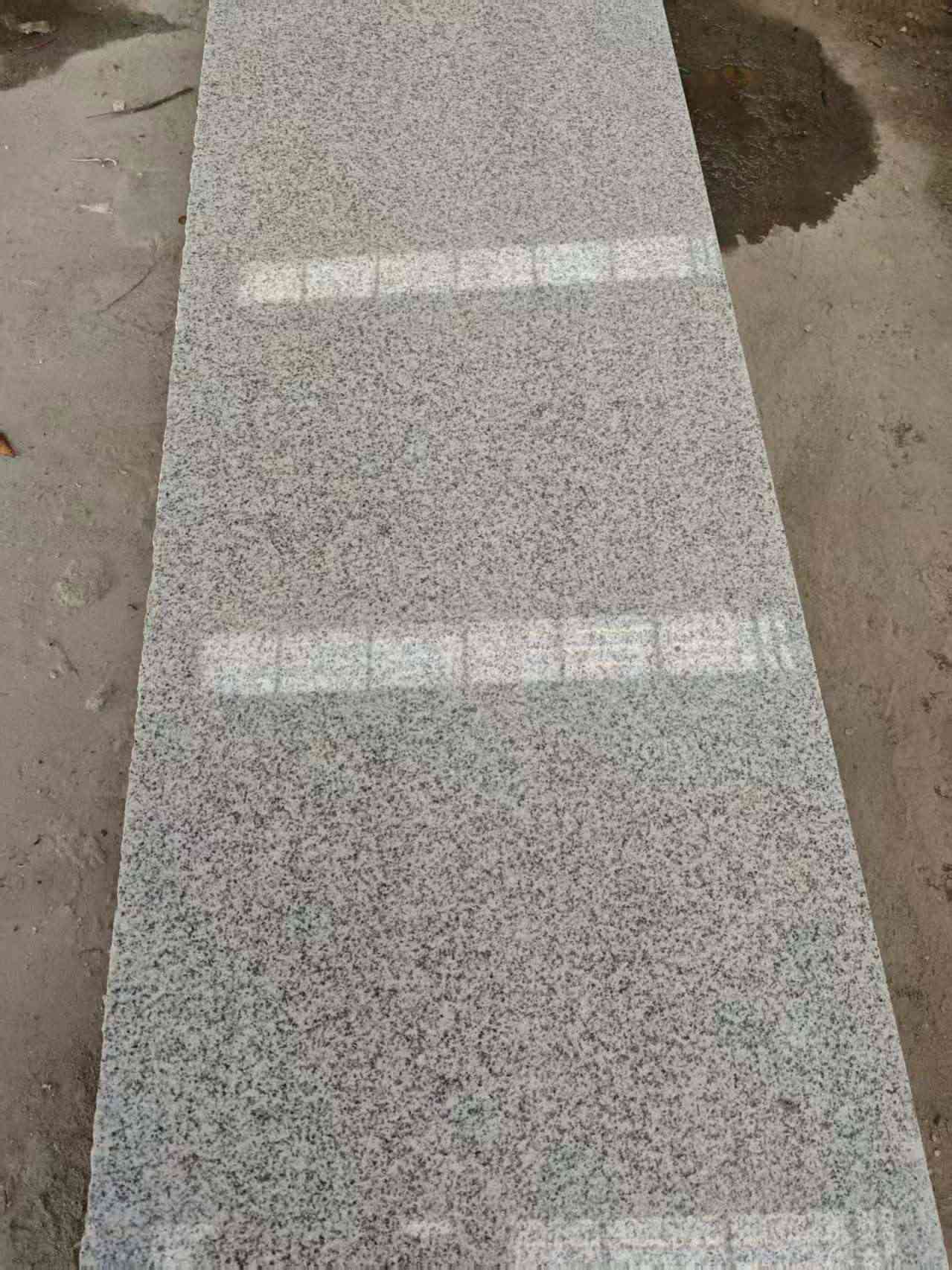 承德芝麻白光面毛板